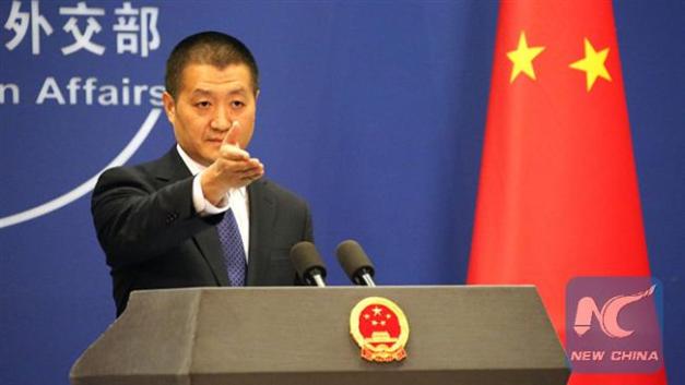 Chinese Foreign Ministry spokesman Lu Kang (Photo by Xinhua)